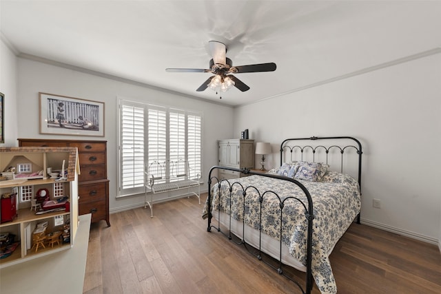 3417 Fern Hill Cir, Waco, TX 76708 - bedroom featuring wood finished floors, baseboards, ornamental molding, and ceiling fan