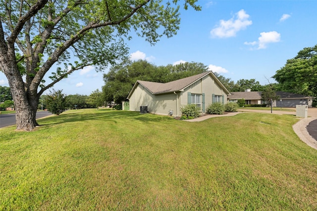 3417 Fern Hill Cir, Waco, TX 76708 - view of side of home with a lawn and brick siding