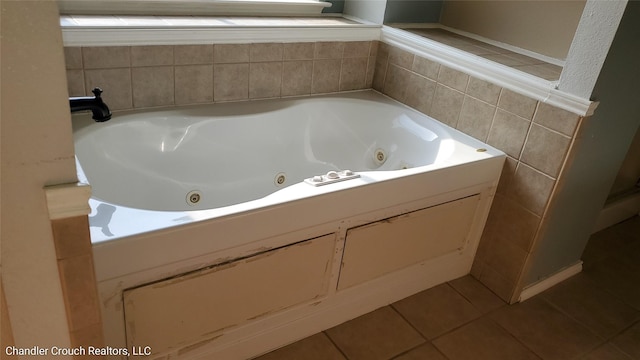 741 Cardinal Dr, Saginaw, TX 76131 - bathroom featuring a tub with jets and tile patterned flooring