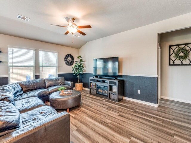 5616 Shannon Creek Rd, Fort Worth, TX 76126 - living area featuring a ceiling fan, wood finished floors, wainscoting, and vaulted ceiling