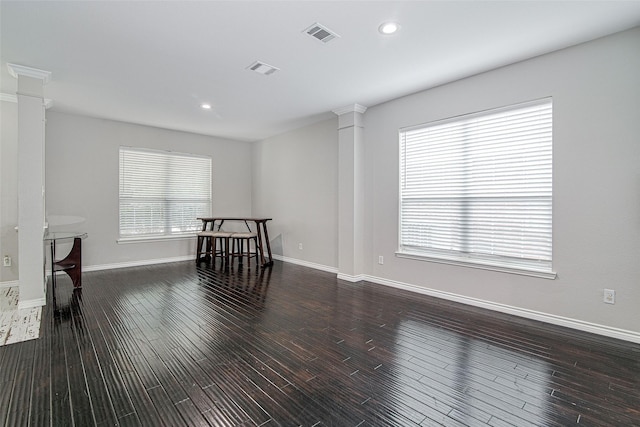 2420 Poplar Spring Rd, Fort Worth, TX 76123 - living area featuring decorative columns, dark wood-style floors, baseboards, and recessed lighting