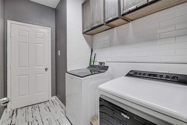 2420 Poplar Spring Rd, Fort Worth, TX 76123 - laundry room featuring cabinet space, washer and clothes dryer, and baseboards