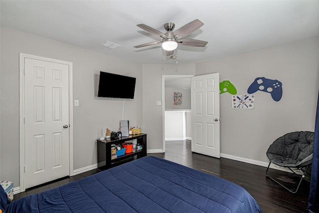 2420 Poplar Spring Rd, Fort Worth, TX 76123 - bedroom with dark wood-style flooring, baseboards, and a ceiling fan