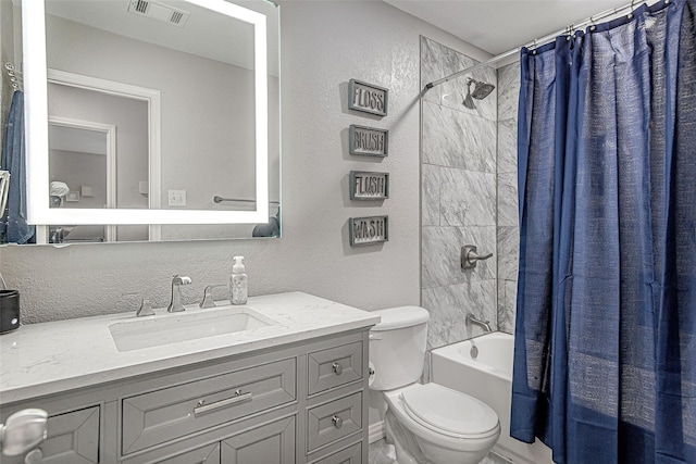 2420 Poplar Spring Rd, Fort Worth, TX 76123 - full bath with shower / bath combination with curtain, toilet, vanity, and a textured wall