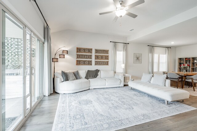 223 Quarry St, Melissa, TX 75454 - living area with light wood-style flooring, a ceiling fan, and vaulted ceiling