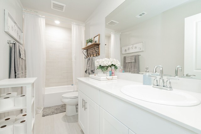 223 Quarry St, Melissa, TX 75454 - bathroom featuring toilet, vanity, and shower / bath combo with shower curtain