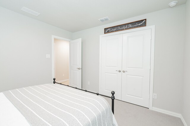223 Quarry St, Melissa, TX 75454 - unfurnished bedroom with light carpet, baseboards, and a closet