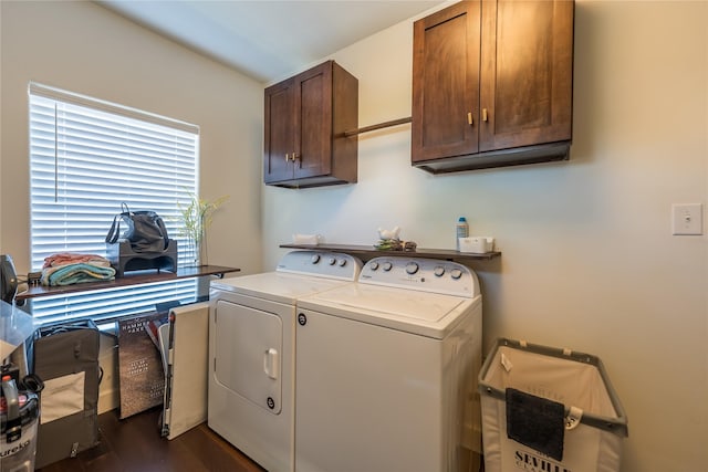 2025 Columbus Ave, Waco, TX 76701 - washroom featuring cabinet space, separate washer and dryer, and dark wood finished floors