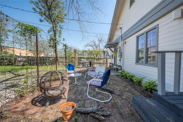 2025 Columbus Ave, Waco, TX 76701 - fenced backyard with an outdoor fire pit and a patio area