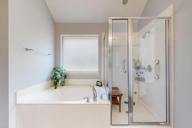8614 Granville Dr, Dallas, TX 75249 - bathroom with a stall shower and a garden tub