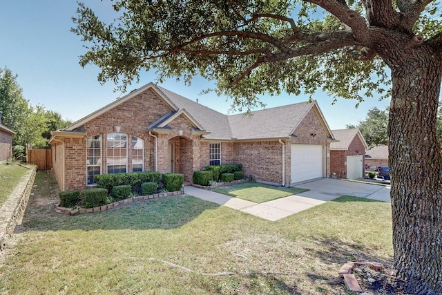 8614 Granville Dr, Dallas, TX 75249 - traditional home with brick siding, concrete driveway, an attached garage, and a shingled roof