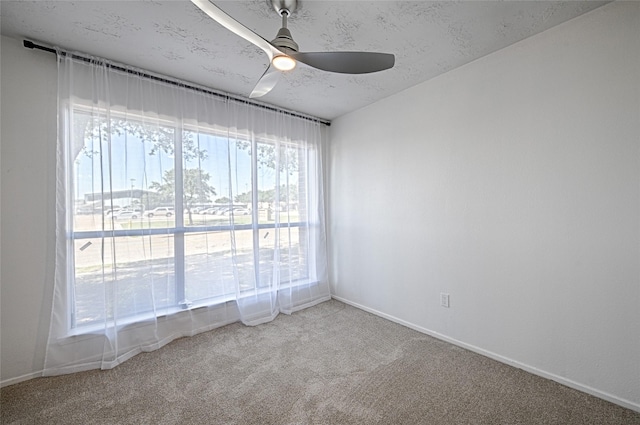 3229 Poteet Dr, Mesquite, TX 75150 - unfurnished room featuring ceiling fan, carpet, and baseboards