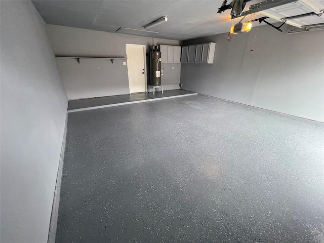 3229 Poteet Dr, Mesquite, TX 75150 - garage with electric water heater and a garage door opener