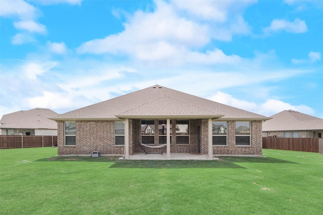 6005 Loving Ct, Midlothian, TX 76065 - back of property featuring brick siding, a patio area, and a shingled roof