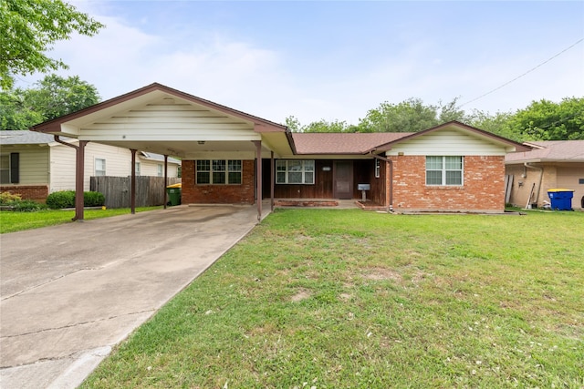 1019 E Elm St, Hillsboro, TX 76645 - single story home with brick siding, driveway, and an attached carport
