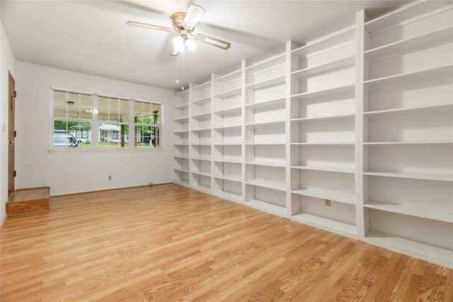 1019 E Elm St, Hillsboro, TX 76645 - unfurnished room with wood finished floors, a ceiling fan, and baseboards