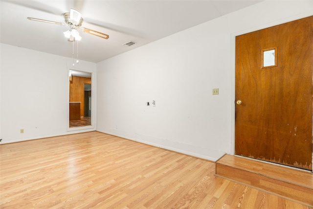 1019 E Elm St, Hillsboro, TX 76645 - unfurnished room featuring wood finished floors, ceiling fan, and baseboards