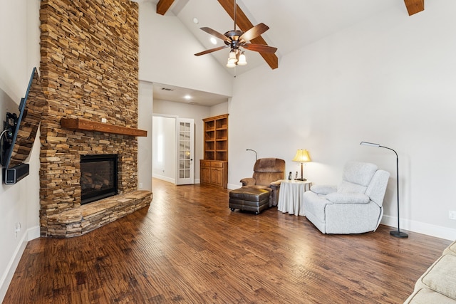 1100 Triple Crown Ct, Bartonville, TX 76226 - living area with high vaulted ceiling, beam ceiling, wood finished floors, ceiling fan, and a stone fireplace