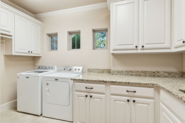 1100 Triple Crown Ct, Bartonville, TX 76226 - clothes washing area featuring separate washer and dryer, cabinet space, crown molding, and baseboards