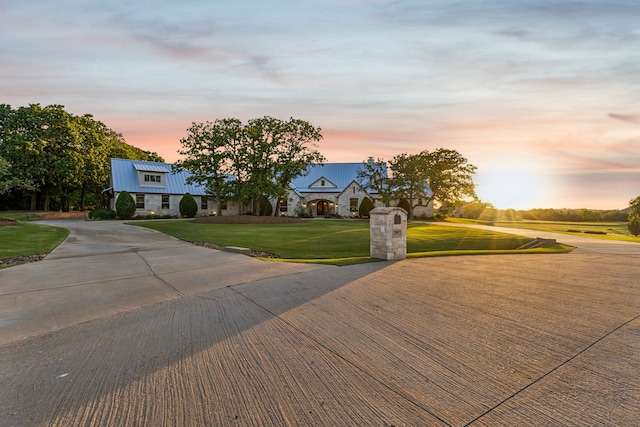 1100 Triple Crown Ct, Bartonville, TX 76226 - view of front of home featuring a front yard, curved driveway, and metal roof