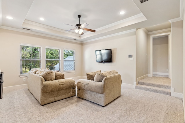 1100 Triple Crown Ct, Bartonville, TX 76226 - living room featuring a raised ceiling, ceiling fan, ornamental molding, light colored carpet, and recessed lighting