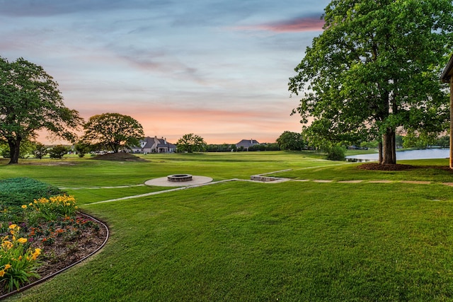 1100 Triple Crown Ct, Bartonville, TX 76226 - view of property's community featuring an outdoor fire pit, a water view, and a lawn
