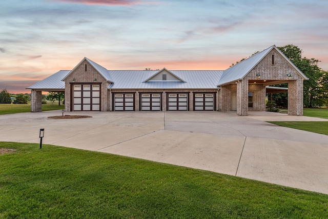 1100 Triple Crown Ct, Bartonville, TX 76226 - view of front of house with brick siding, driveway, a yard, and metal roof