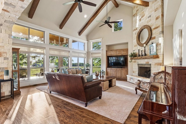 1100 Triple Crown Ct, Bartonville, TX 76226 - living area featuring a fireplace, high vaulted ceiling, wood-type flooring, beam ceiling, and a ceiling fan
