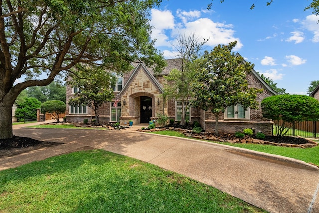 1809 Summit Ct, Keller, TX 76262 - tudor house with stone siding and brick siding