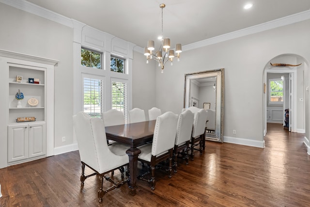 1809 Summit Ct, Keller, TX 76262 - dining space with a chandelier, arched walkways, dark wood-style floors, crown molding, and baseboards