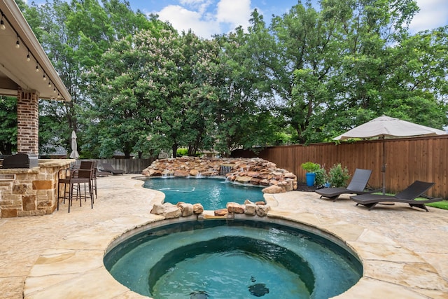 1809 Summit Ct, Keller, TX 76262 - view of swimming pool with a fenced backyard, a patio area, area for grilling, and a pool with connected hot tub