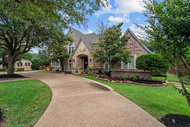 1809 Summit Ct, Keller, TX 76262 - tudor house with brick siding, stone siding, and concrete driveway