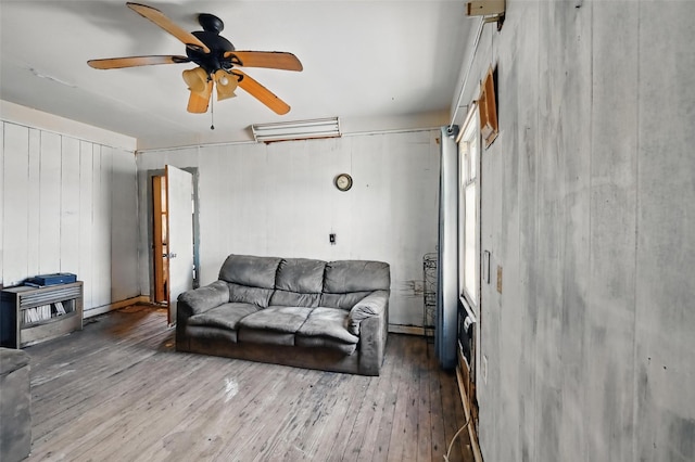 402 S Watson St, Alvarado, TX 76009 - living area featuring wood-type flooring and a ceiling fan