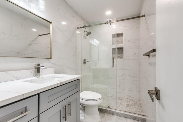 2638 Custer Pkwy Unit B, Richardson, TX 75080 - full bath with tile walls, toilet, a marble finish shower, and vanity