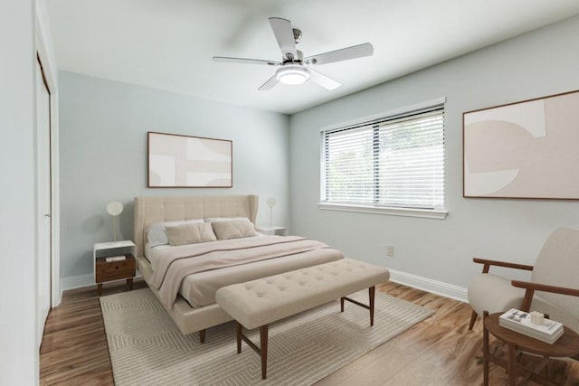 2638 Custer Pkwy Unit B, Richardson, TX 75080 - bedroom with wood finished floors, baseboards, and ceiling fan
