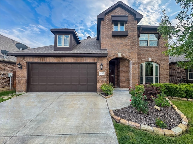 4237 Old Timber Ln, Fort Worth, TX 76036 - view of front of house featuring brick siding, driveway, a garage, and roof with shingles