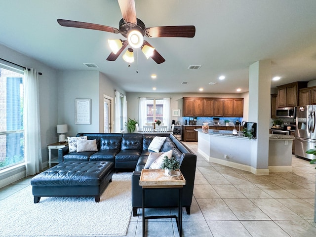 4237 Old Timber Ln, Fort Worth, TX 76036 - living room featuring light tile patterned floors, recessed lighting, ceiling fan, and baseboards