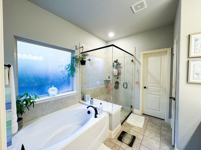 4237 Old Timber Ln, Fort Worth, TX 76036 - bathroom with a garden tub, a shower stall, and tile patterned flooring
