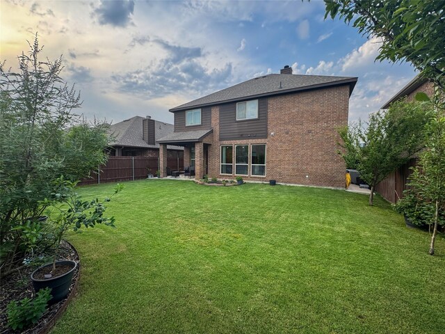 4237 Old Timber Ln, Fort Worth, TX 76036 - back of house with brick siding, a chimney, a shingled roof, and a patio