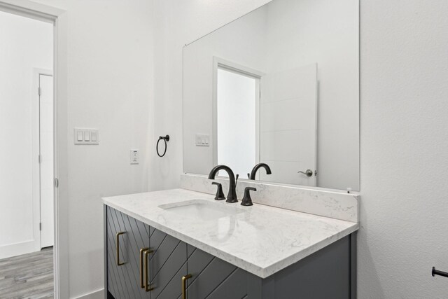 3613 Durango Trl, Granbury, TX 76048 - bathroom featuring vanity and wood finished floors