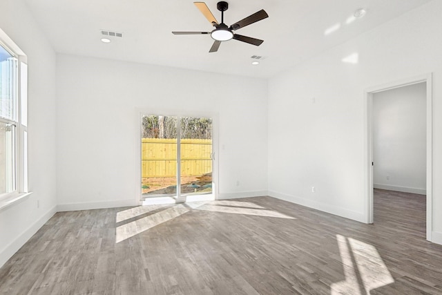 3613 Durango Trl, Granbury, TX 76048 - unfurnished room with healthy amount of natural light, a ceiling fan, wood finished floors, baseboards, and recessed lighting