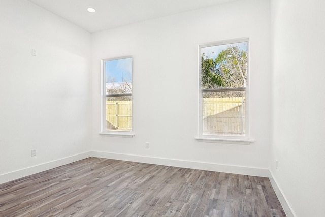 3613 Durango Trl, Granbury, TX 76048 - empty room with wood finished floors, baseboards, and recessed lighting