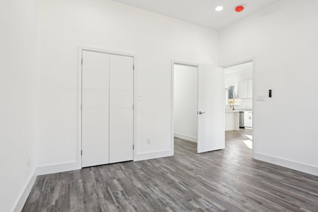 3613 Durango Trl, Granbury, TX 76048 - unfurnished bedroom featuring wood finished floors, baseboards, and recessed lighting