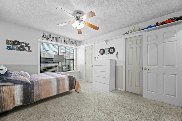 6939 Calender Rd, Arlington, TX 76001 - bedroom featuring carpet flooring, a textured ceiling, and ceiling fan