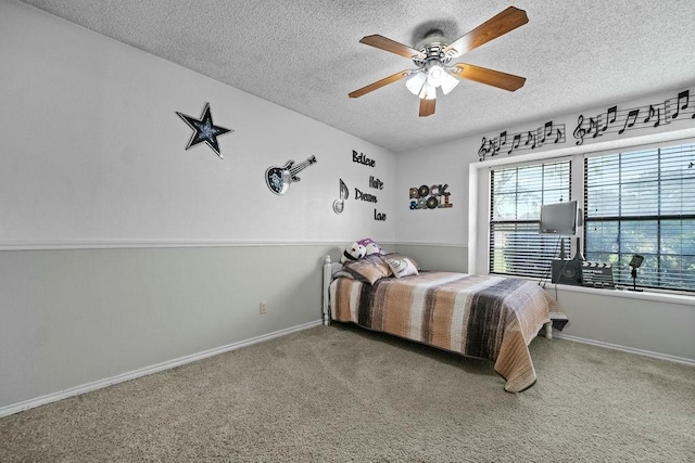 6939 Calender Rd, Arlington, TX 76001 - carpeted bedroom featuring a textured ceiling, baseboards, and ceiling fan