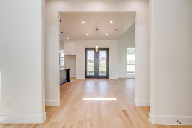 138 Buddy Ct, Millsap, TX 76066 - foyer with light wood-type flooring, baseboards, recessed lighting, and french doors