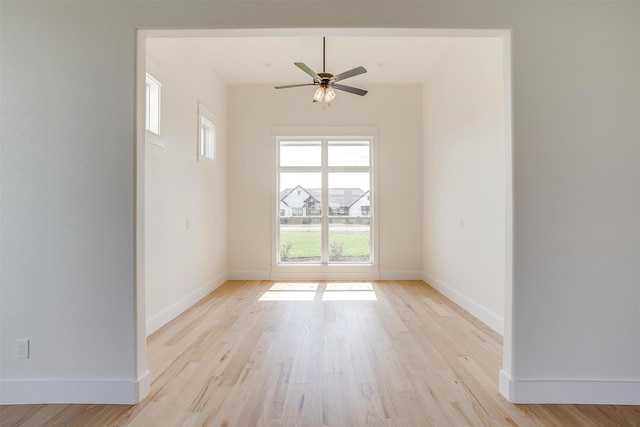 138 Buddy Ct, Millsap, TX 76066 - unfurnished room featuring light wood-style flooring, baseboards, and ceiling fan