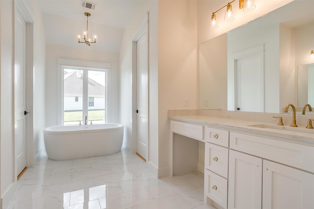 138 Buddy Ct, Millsap, TX 76066 - full bath with marble finish floors, a soaking tub, vanity, baseboards, and a chandelier