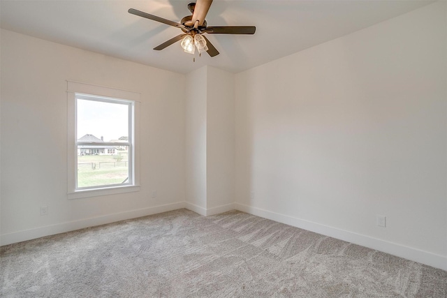 138 Buddy Ct, Millsap, TX 76066 - empty room featuring light carpet, baseboards, and a ceiling fan
