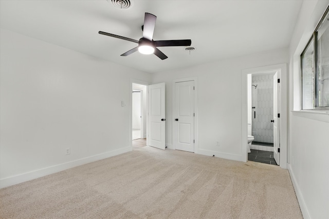 4709 Shady Hill Dr, Forest Hill, TX 76119 - unfurnished bedroom featuring carpet flooring, baseboards, ensuite bath, and a ceiling fan